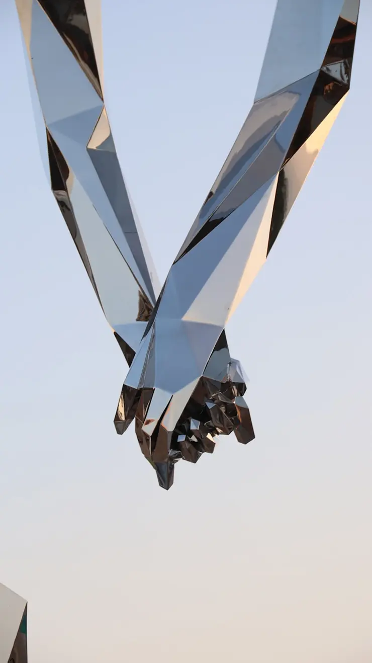 hands clasped together